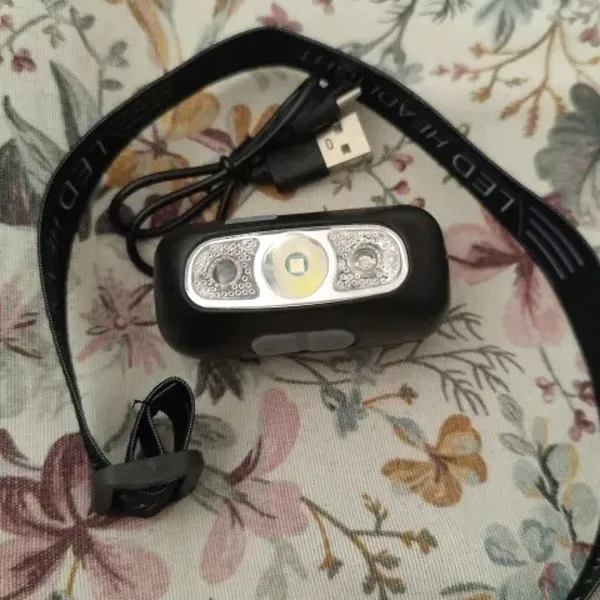 LumenTrail headlamp photographed by Aisha M., a verified buyer